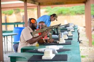 Seated at the range at Fossil Point Sporting Grounds